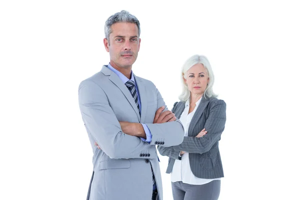 Businesswoman and man with arms crossed — Stock Photo, Image