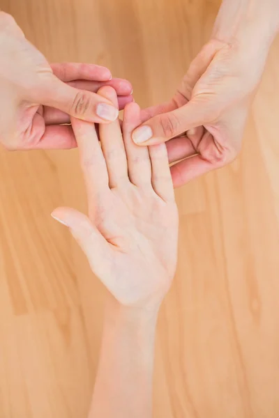 Physiotherapist doing hand massage — Stock Photo, Image