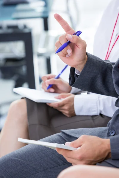 Businessman taking note during a meeting — Stock Photo, Image