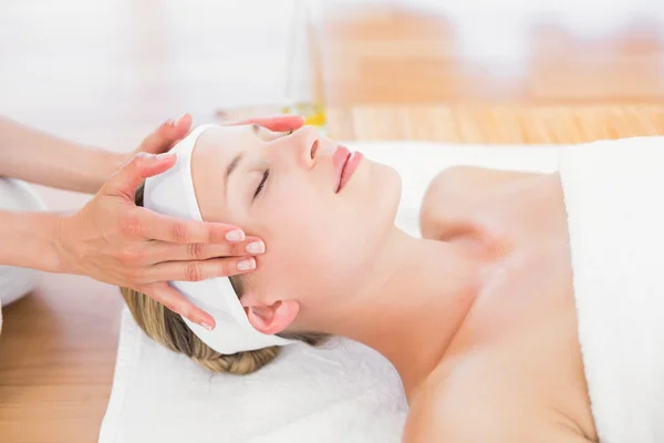 Blonde enjoying a massage — Stock Photo, Image