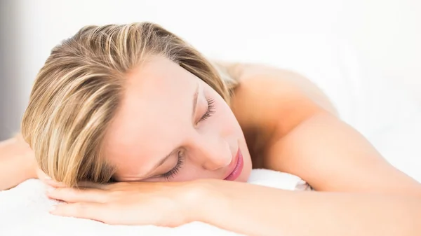 Blonde lying on massage table — Stock Photo, Image