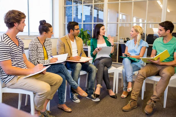 Attentive creative business people in meeting — Stock Photo, Image