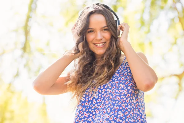 Pretty brunette with headphones — Stock Photo, Image