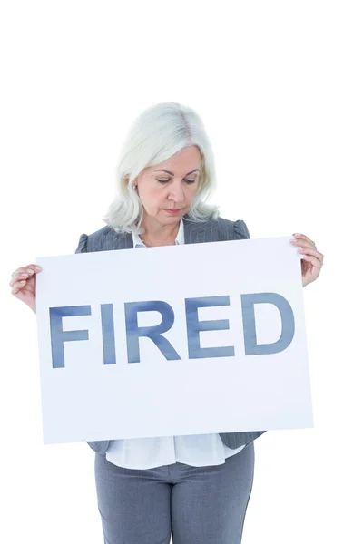 Businesswoman holding sign in front of her — Stock Photo, Image