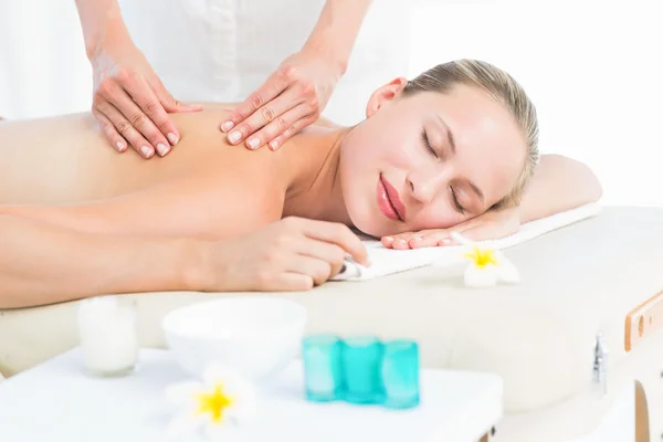 Blonde enjoying a back massage — Stock Photo, Image