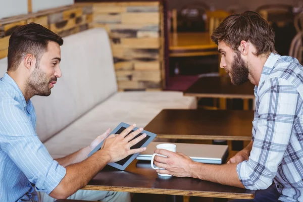 Business team looking at tablet — Stock Photo, Image