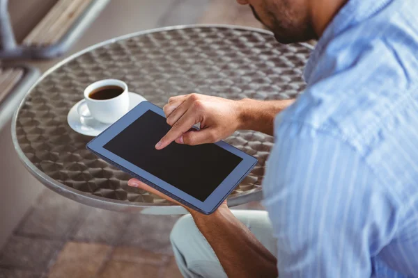 Attentive businessman using a tablet — Stock Photo, Image