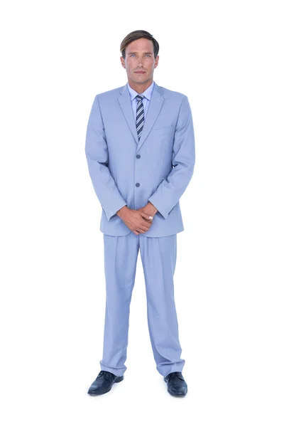 Standing businessman on white — Stock Photo, Image