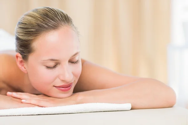 Peaceful blonde lying on towel — Stock Photo, Image