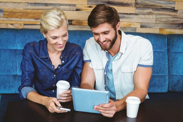 Cute couple on date watching photos — Stock Photo, Image