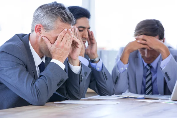 Colleagues with laptop and tablet in meeting — Stock Photo, Image