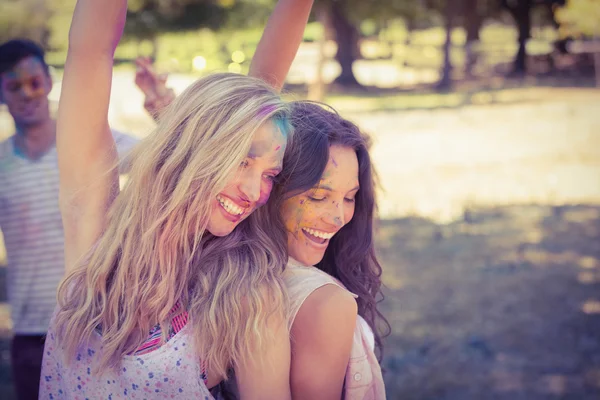 Friends having fun with powder paint — Stock Photo, Image