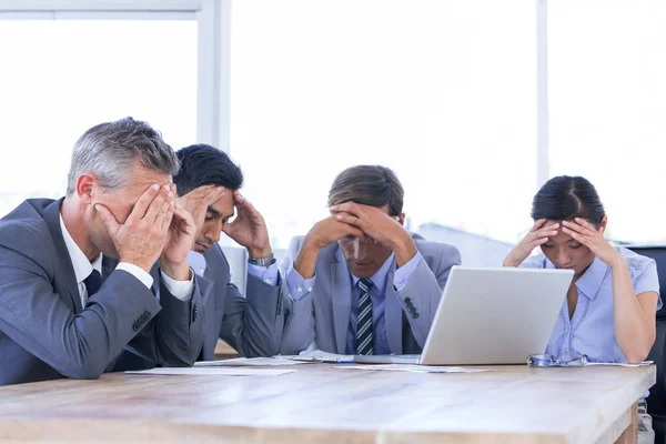 Colleagues with laptop and digital tablet — Stock Photo, Image