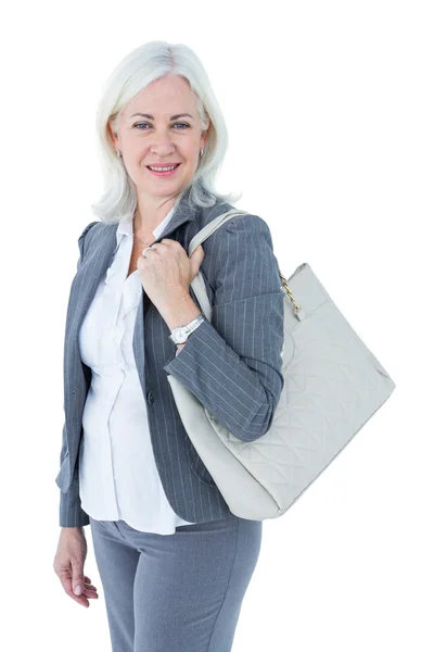 Mujer de negocios sonriente con bolsa —  Fotos de Stock