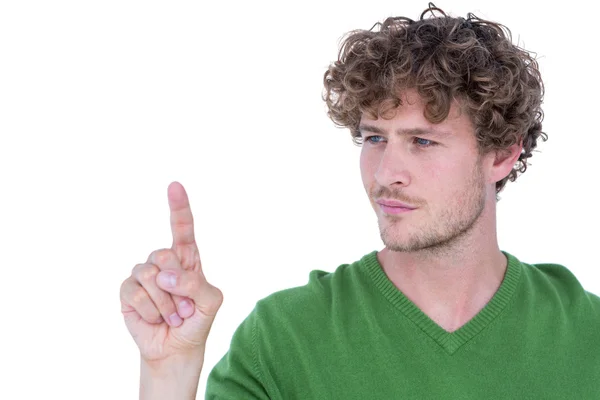 Feliz hombre guapo señalando con el dedo hacia arriba — Foto de Stock