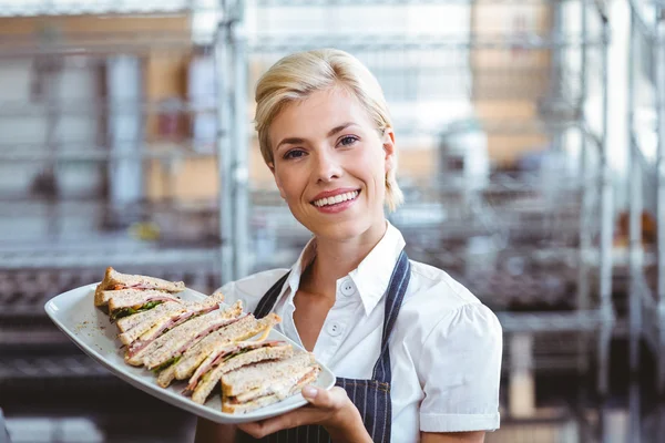 Selfassured female waitress smiling — Stock Photo, Image