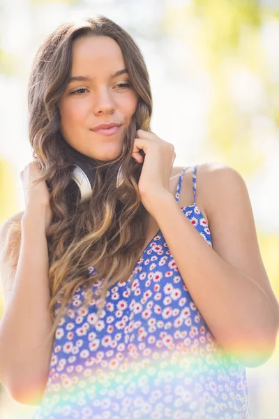 Pretty brunette with headphones — Stock Photo, Image