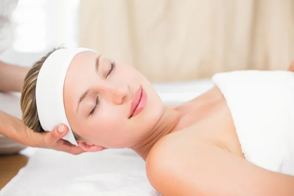 Blonde lying on massage table — Stock Photo, Image