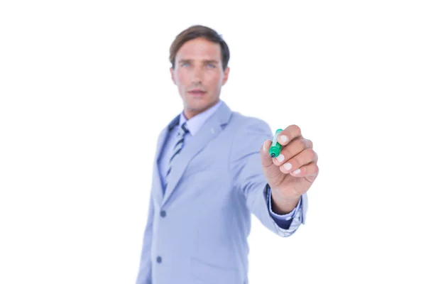 Businessman writing with black marker — Stock Photo, Image