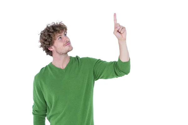 Homem bonito feliz apontando algo — Fotografia de Stock