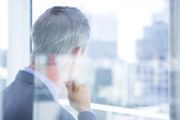 Thinking businessman in the office — Stock Photo, Image