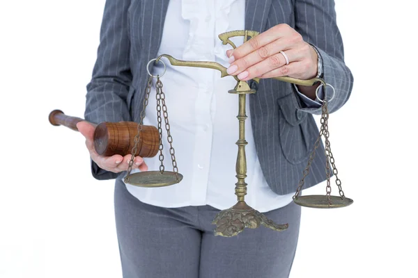 Businesswoman holding scales of justice — Stock Photo, Image