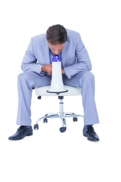 Businessman talking through megaphone — Stock Photo, Image