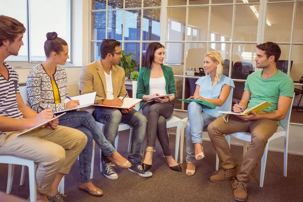 Attentive creative business people in meeting — Stock Photo, Image