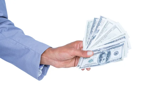 Businessman holding bribe — Stock Photo, Image