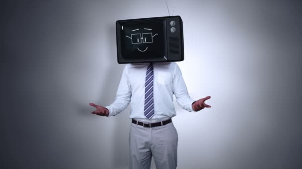 Businessman with tv on his head — Stock Video