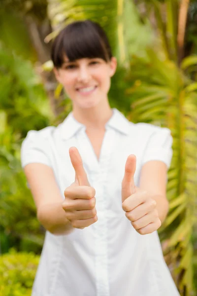 Woman gesturing thumbs up before spa — Stock Photo, Image