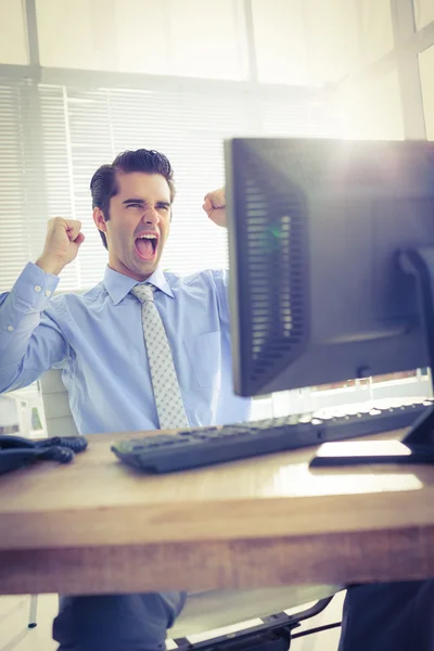 Cheerful businessman cheering in office — Stock Photo, Image