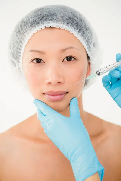 Relaxed model having botox injection — Stock Photo, Image