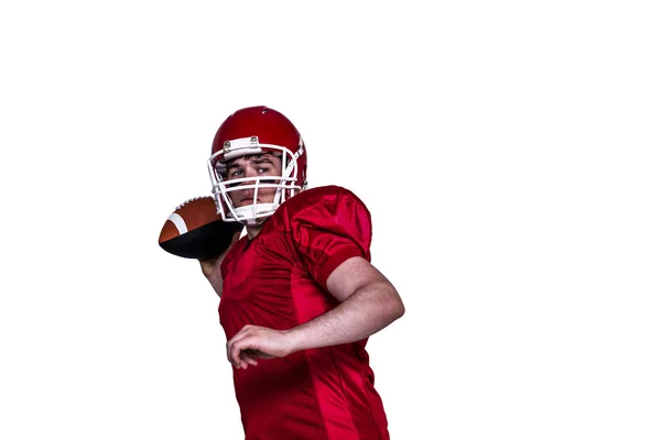 American Football Spieler wirft einen Ball — Stockfoto