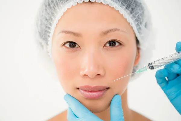 Relaxed model having botox injection — Stock Photo, Image