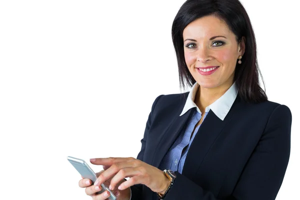 Happy businesswoman sending a text — Stock Photo, Image