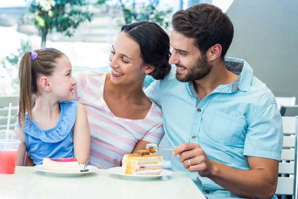 A family eating at the restaurant — Stock Photo, Image