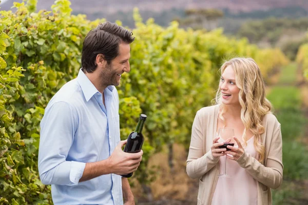 Young happy couple smiling at each other — Stock Photo, Image