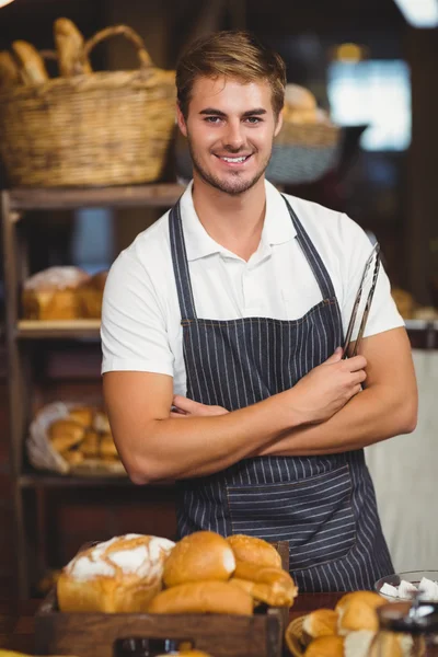 Handsome waiter with arms crossed — Stock Photo, Image