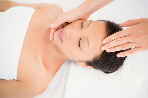 Young woman receiving head massage — Stock Photo, Image