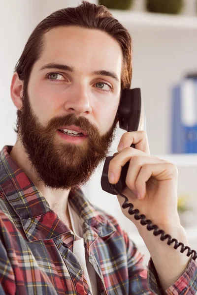 Hipster businessman making a call — Stockfoto