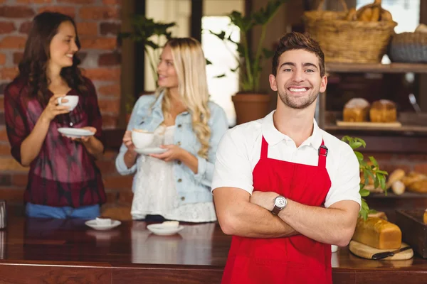 Handsome waiter with arms crossed — Stock Photo, Image