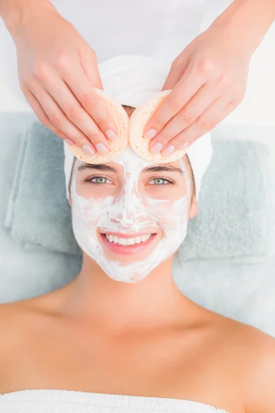 Hands cleaning woman face with swabs — Stock Photo, Image