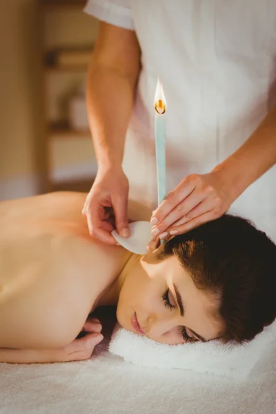 Woman getting ear candling treatment — Stock Photo, Image