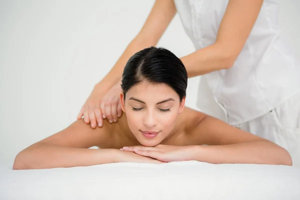 Brunette enjoying massage — Stock Photo, Image