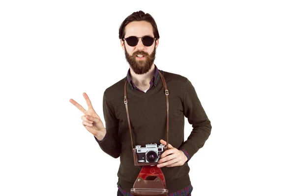 Hipster s kamerou vinobraní — Stock fotografie