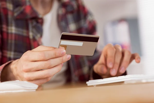 Hipster businessman shopping online with card — Stock Photo, Image