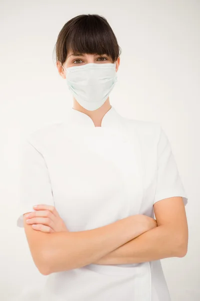 Verpleegkundige dragen beschermend masker — Stockfoto