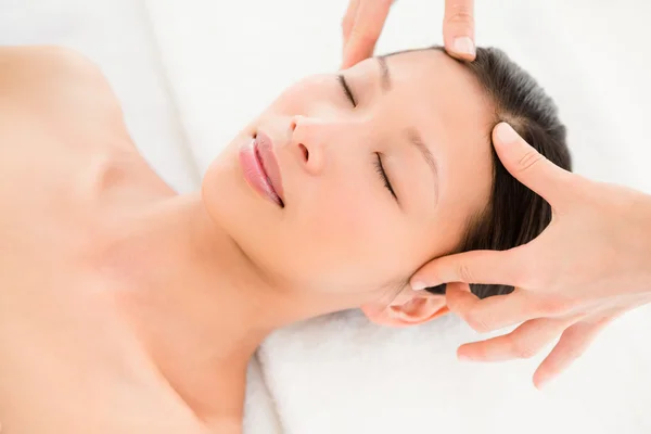 Young woman receiving head massage — Stock Photo, Image