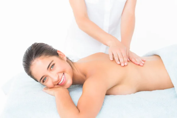 Brunette enjoying a massage — Stock Photo, Image